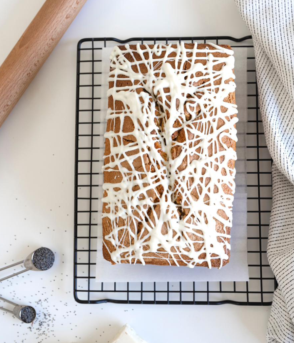 Buy White Chocolate Loaf | Butterscotch Cake with Poppy Seeds and White Chocolate topping from Poppylicious Bakery online at VEND. Explore more desserts now